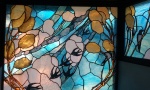 Stained glass window, swallows.